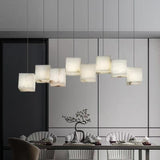 Alabaster Box Curated Alabaster Chandelier warm illuminated room view