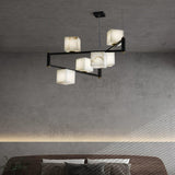 Alabaster Square Box Curated Alabaster Chandelie warm illuminated room view