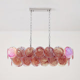 Marisca Curated Amber Art Glass Chandelier – illuminated warm ambiance setting #1