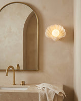 Marisca Alabaster Curated Alabaster Wall Sconce installed in residential dining space