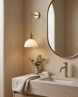 Marlowe Alabaster Curated Alabaster Wall Sconce warm illuminated room view