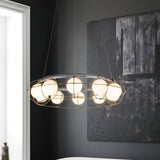 Maytoni Round Curated Mouth-Blown Frosted Glass installed in residential dining space
