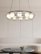 Maytoni Round Curated Mouth-Blown Frosted Glass warm illuminated room view
