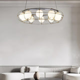 Maytoni Round Curated Mouth-Blown Frosted Glass – illuminated warm ambiance setting