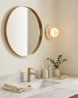 Mia Ball Alabaster Curated Alabaster Wall Sconce installed in residential dining space
