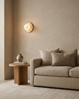 Mia Ball Alabaster Curated Alabaster Wall Sconce warm illuminated room view