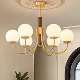 Midas Touch Walnut Sphere Chandelier – Ambient Illumination in Luxury Interior Setting View 4