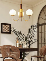 Midas Touch Walnut Sphere Chandelier – Ambient Illumination in Luxury Interior Setting View 7