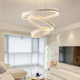 Modern Circle LED Curated Iron & Glass Chandelie warm illuminated room view