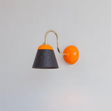 Modica Curated Iron & Glass Wall Sconce installed in residential dining space