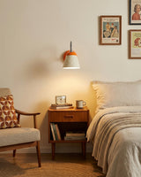 Modica Curated Iron & Glass Wall Sconce warm illuminated room view
