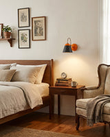Modica Curated Iron & Glass Wall Sconce – illuminated warm ambiance setting