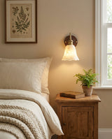Nalia Alabaster Curated Alabaster Wall Sconce installed in residential dining space