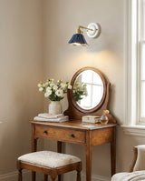 Navira Curated Solid Brass Wall Sconce – illuminated warm ambiance setting