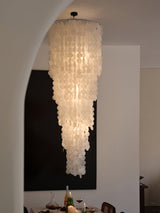 Nerida Shell Curated Iron & Glass Chandelier installed in residential dining space