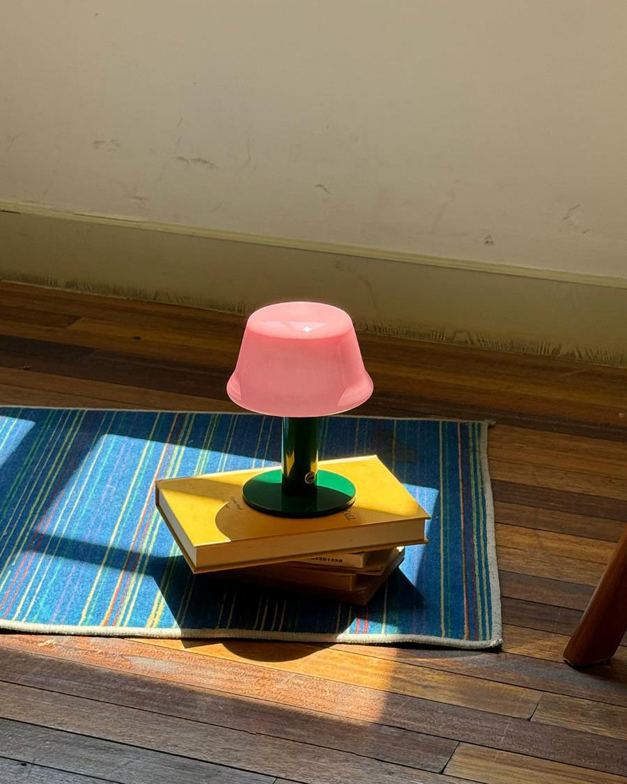 Nolvia Curated Mouth-Blown Frosted Glass Table L – illuminated warm ambiance setting