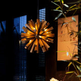 Nova Burst Curated Iron & Glass Chandelier installed in residential dining space