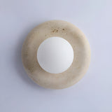 Nuvane Orb Curated Yellow Travertine Wall Sconce – spatial dining room perspective