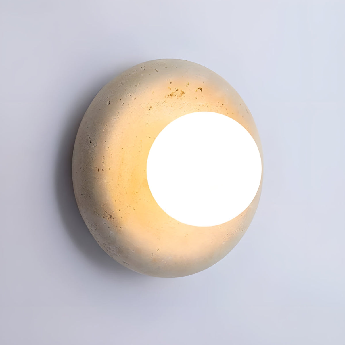 Nuvane Orb Curated Yellow Travertine Wall Sconce – macro detail view #1
