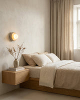 Yellow Travertine craftsmanship detail on Nuvane Orb Curated Yellow Travertine Wall Sconce