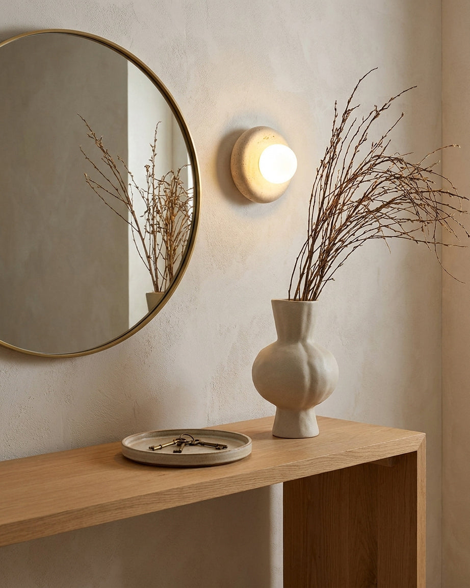 Nuvane Orb Curated Yellow Travertine Wall Sconce – illuminated warm ambiance setting