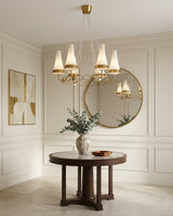 Orletta Curated Mouth-Blown Frosted Glass Chande warm illuminated room view