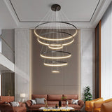 Orrery Rings Curated Solid Brass Chandelier – structural canopy joint detail