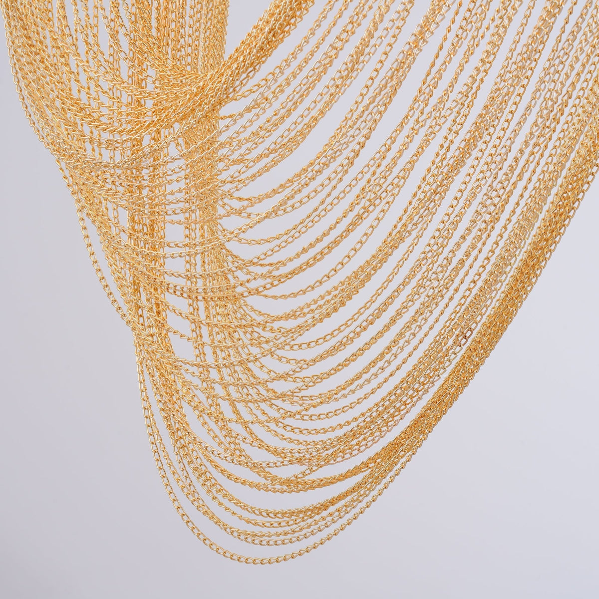 Otero Curated Iron & Glass Chandelier – architectural ceiling profile