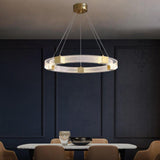 Parallel Ring LED Curated Solid Brass Chandelier installed in residential dining space