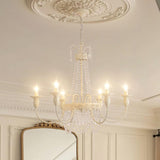 Pavia Curated Mouth-Blown Frosted Glass Chandeli installed in residential dining space
