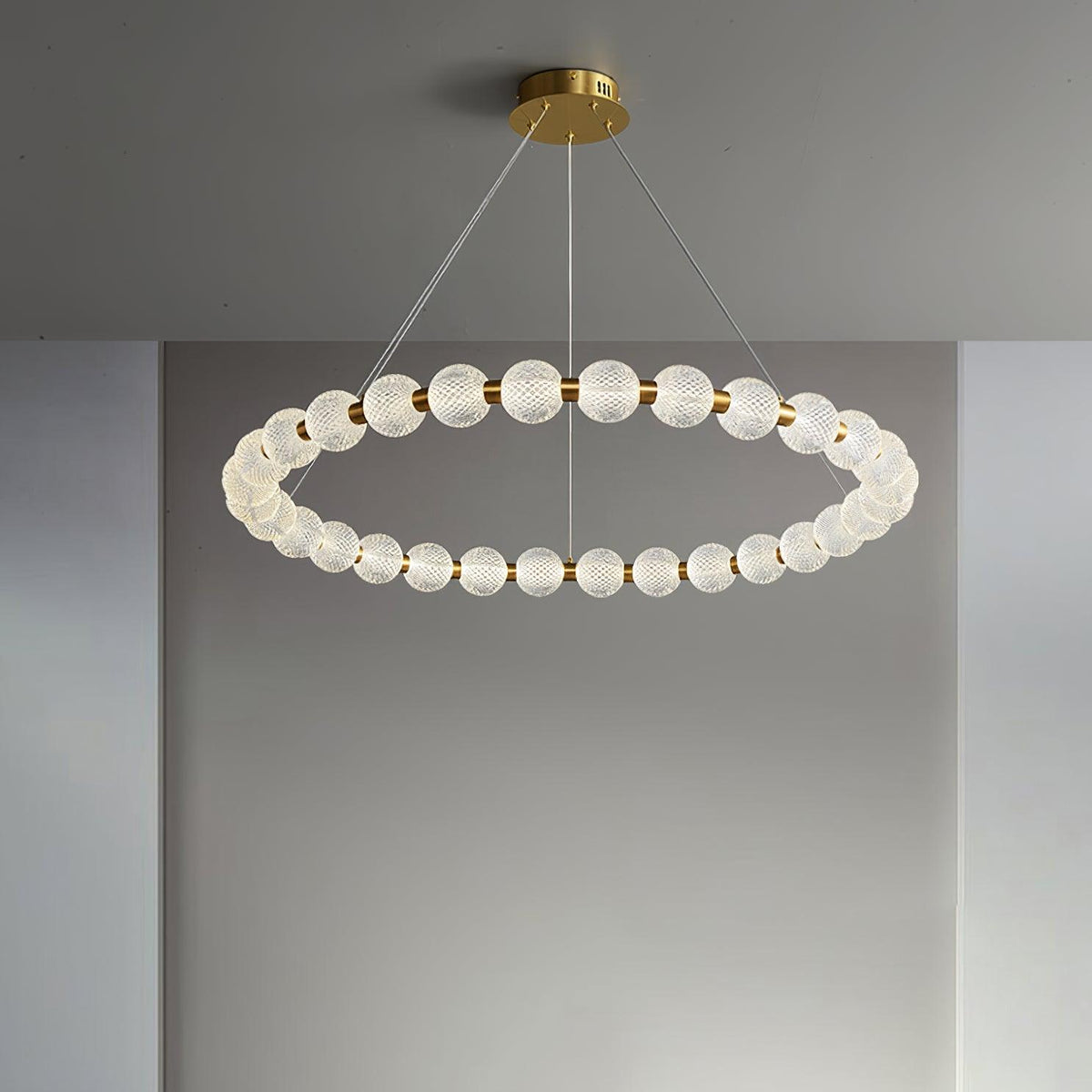 Pearl Curated Solid Brass Chandelier – illuminated warm ambiance setting