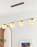 Persimmon Dining Room Curated Mouth-Blown Froste – illuminated warm ambiance setting