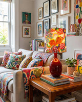 Petalyn Curated Hand-Thrown Ceramic Table Lamp warm illuminated room view