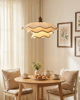 Pliora Curated Iron & Glass Pendant Light – illuminated warm ambiance setting