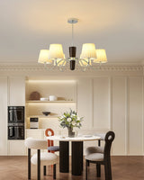 Plisse Curated Solid Hardwood Chandelier – illuminated warm ambiance setting