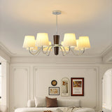 Plisse Curated Solid Hardwood Chandelier installed in residential dining space