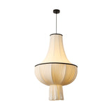 Plisselle Curated Iron & Glass Pendant Light – illuminated warm ambiance setting #1