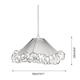 Pluma Fringe Curated Woven Rattan Pendant Light – illuminated warm ambiance setting