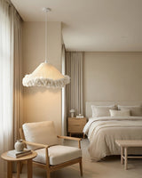Pluma Fringe Curated Woven Rattan Pendant Light warm illuminated room view