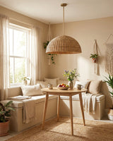 Ravena Curated Solid Brass Pendant Light warm illuminated room view