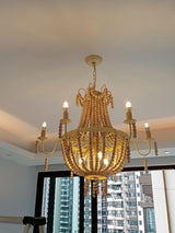 Regas Curated Iron & Glass Chandelier – spatial dining room perspective