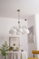 Renee Curated Mouth-Blown Frosted Glass Chandeli – illuminated warm ambiance setting