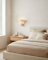 Roche Alabaster Curated Alabaster Wall Sconce warm illuminated room view