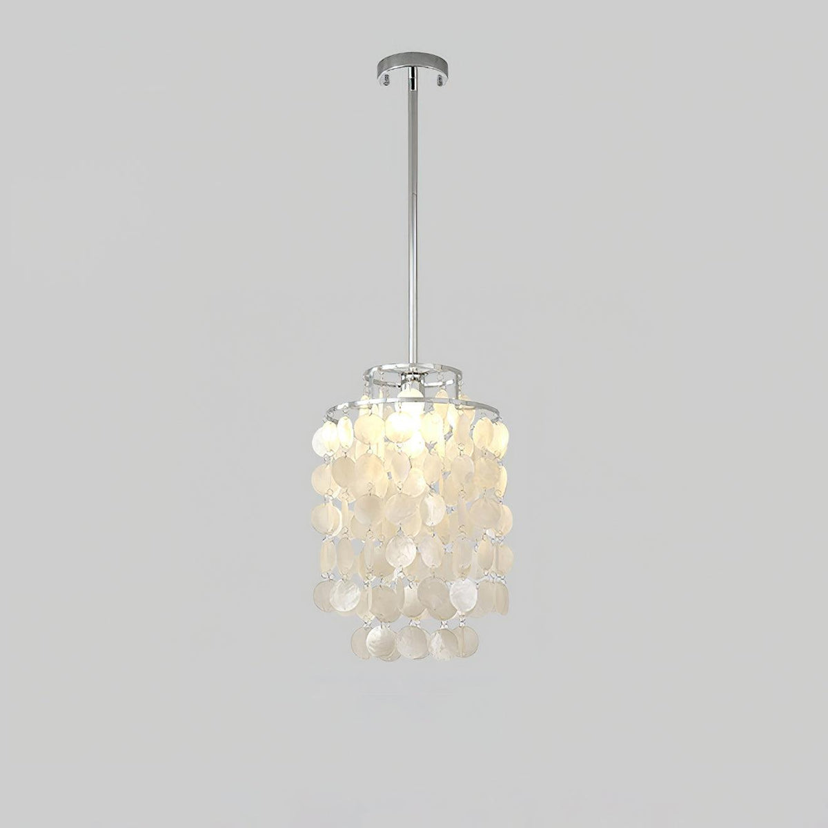 Round Shell Curated Iron & Glass Chandelier – illuminated warm ambiance setting #1