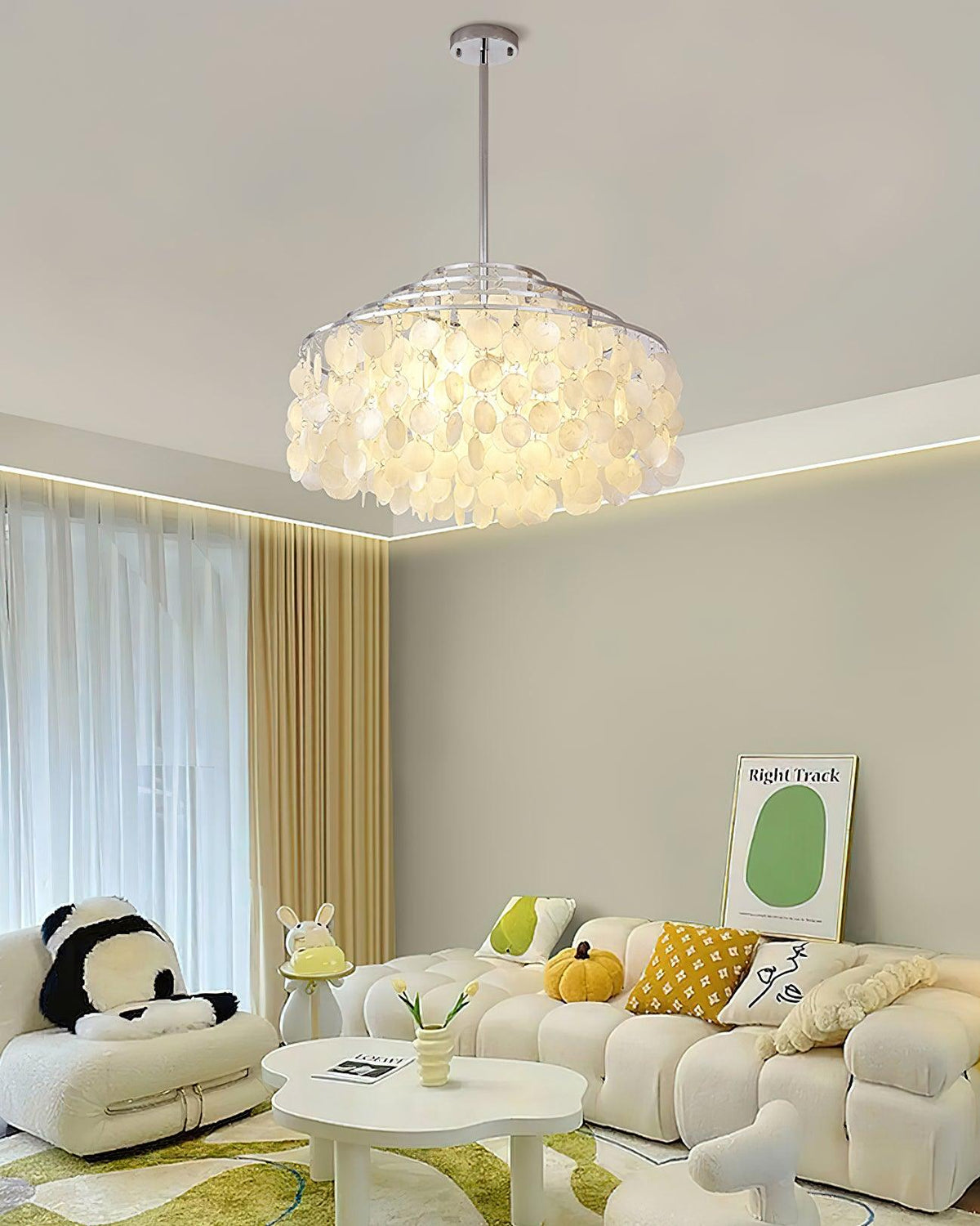 Round Shell Curated Iron & Glass Chandelier – unlit natural material contrast