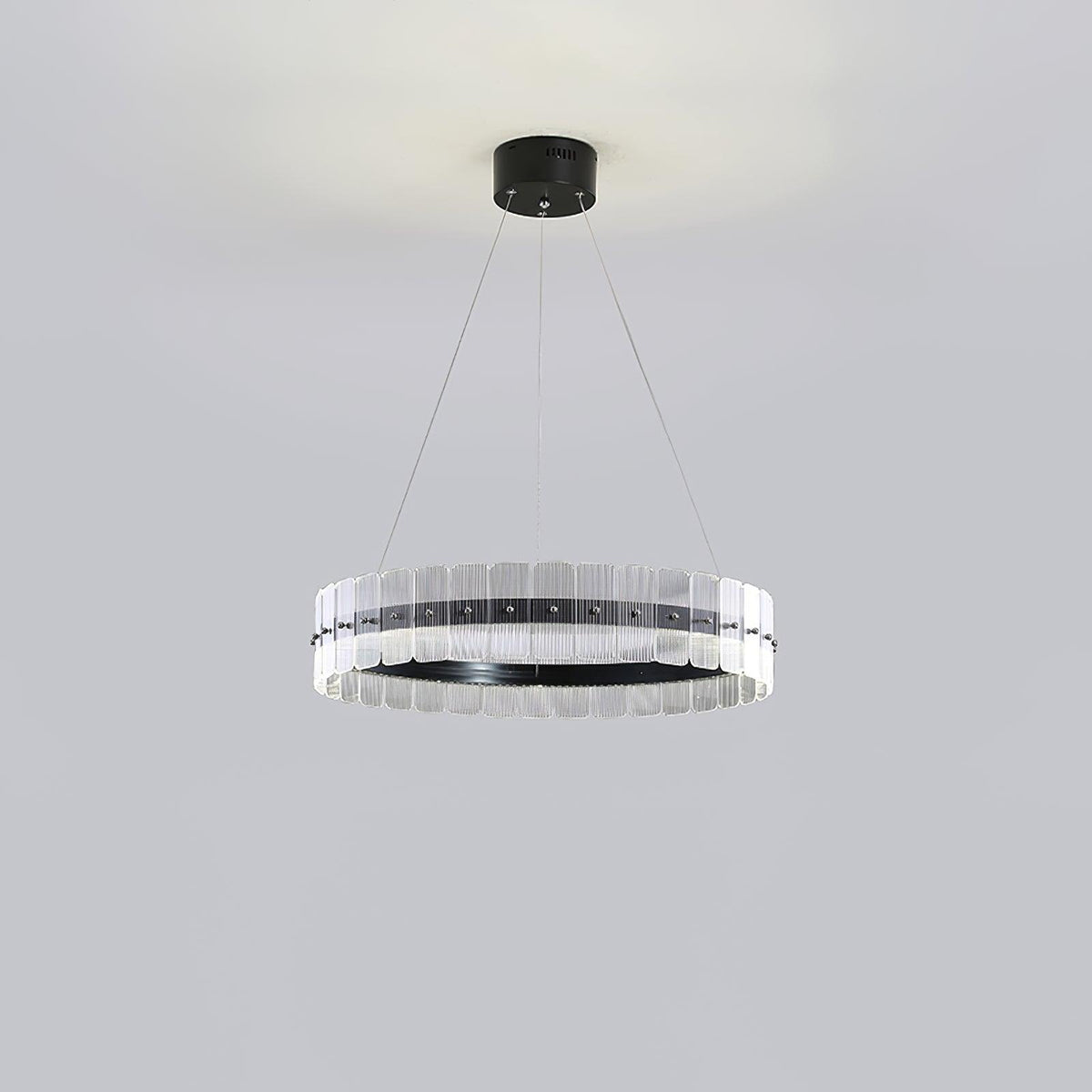 Saturno LED Curated Optical Acrylic Chandelier – illuminated warm ambiance setting #1