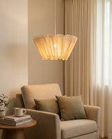 Scallora Curated Iron & Glass Pendant Light warm illuminated room view