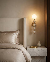 Selene Gourd Alabaster Curated Alabaster Wall Sc installed in residential dining space