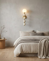 Selene Gourd Alabaster Curated Alabaster Wall Sc warm illuminated room view