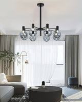 Selva Black Curated Mouth-Blown Frosted Glass Ch installed in residential dining space